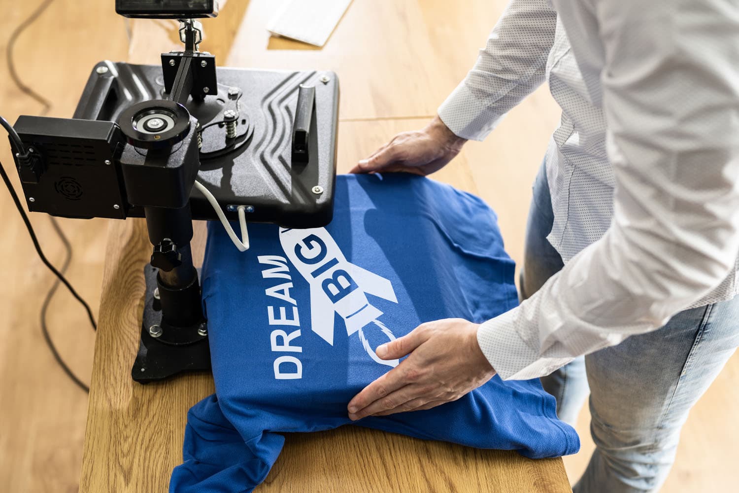 Custom merchandise design process with fabric swatches and tech pack sketches